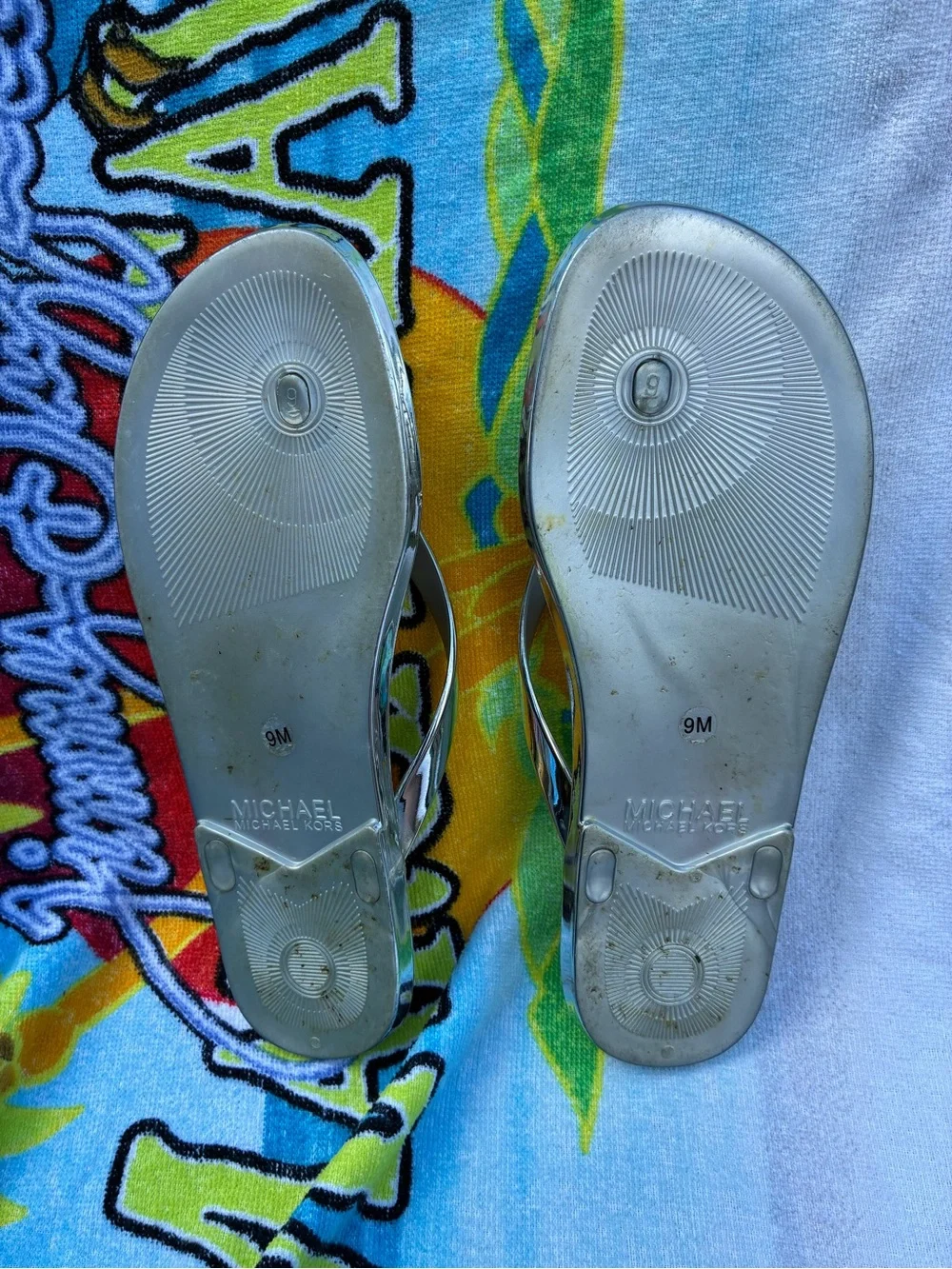 Michael Kors Metallic Silver Logo Flip Flops